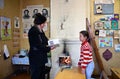 Rural school in Russia, teacher teaches schoolgirl