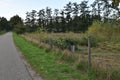 Landscape with rural sealed road on the rim of a typical Dutch streamvalley Royalty Free Stock Photo