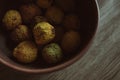 Shriveled quince fruits in rural still life Royalty Free Stock Photo