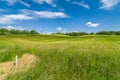 summer landscape. hilly agricultural field under a beautiful cloudy sky