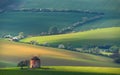 Rural Summer Landscape With Old Windmill And White Flowering TreesnBeautiful Sunset Above The Ancient Windmill On The Green Wavy Royalty Free Stock Photo