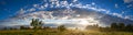 rural summer landscape with road, a meadow,forest and fog, panorama Royalty Free Stock Photo