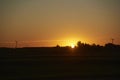 Rural sunset scene, bright orange sky over an Argentinian countryside Royalty Free Stock Photo