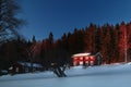 Rural Swedish house illuminated by sunset light Royalty Free Stock Photo