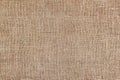 Rural texture of sackcloth. Background of very coarse, rough fabric woven made of flax, jute or hemp. Burlap bag material. Design Royalty Free Stock Photo