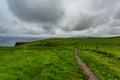 Rural trail between the Irish fields from Doolin to the Cliffs of Moher Royalty Free Stock Photo