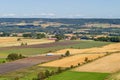 Rural view with fields and a road with traffic Royalty Free Stock Photo