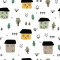 Rural village background seamless pattern with houses and trees hand drawn design in cartoon style Royalty Free Stock Photo