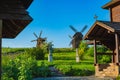 Rural village with wooden mills and a church Royalty Free Stock Photo
