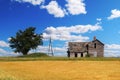 rural wheat field harvest abandoned empty farmhouse farm prairie homestead drought deserted farmland Royalty Free Stock Photo