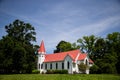 Rural white church with a red roof in Jackson, Mississippi, United states