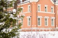 Rural winter landscape. An old beige snow-covered house Royalty Free Stock Photo