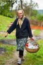 Rural woman with basket outdoor