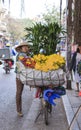 Rural women selling flowers on the streets of Hanoi in the early morning
