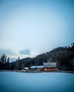 Wooden cottage with blue starry sky in evening Royalty Free Stock Photo