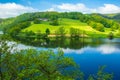 Rursee at Eifel National Park, Germany. Scenic view of lake Rursee and surrounded green hills in North Rhine-Westphalia Royalty Free Stock Photo
