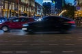 Rush hour car traffic on the night street. motion blur Royalty Free Stock Photo