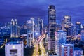 Rush hour traffic with skyscrapers at evening time Royalty Free Stock Photo