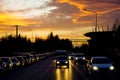 Rush hour traffic urban scene at scenic sunset