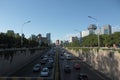 Rush street with heavy traffic and cityscape in Beijing, China