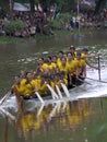 Rush to the finish line. Girls boat tries to win race during Bon om touk. Royalty Free Stock Photo