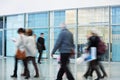 Group of Businesspeople Walking in New Office Building, Motion B Royalty Free Stock Photo