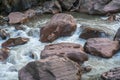 Rushing river flowing through eroded rocks in Tingo Maria Peru Royalty Free Stock Photo