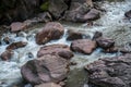 Rushing river flowing through eroded rocks in Tingo Maria Peru Royalty Free Stock Photo