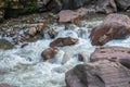 Rushing river flowing through eroded rocks in Tingo Maria Peru Royalty Free Stock Photo