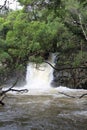 A rushing waterfall in a rainforest, Twin Falls in Haiku, Maui on the road to Hana, Hawaii Royalty Free Stock Photo