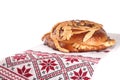 Rushnyk with korovai on white background. Ukrainian bread and salt welcoming tradition