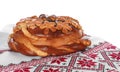 Rushnyk with korovai on white background. Ukrainian bread and salt welcoming tradition