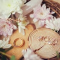 Rusic style wedding, natural decorations. Wood, flowers and wedding jewelry Royalty Free Stock Photo