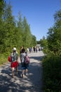 People walk in the park of the Great Marble Canyon in Ruskeala in the Republic of Karelia in Russia