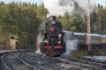 Steam locomotive L-5164 with retro train \