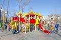 Russia. Abakan. Children play in the children`s town, in the municipal park. Spring 2019.