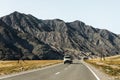 Russia, Altai, mountain landscape. Road with an old car, mountains Royalty Free Stock Photo