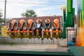 Russia, Arkhangelsk - July 2019. A young heterosexual couple rides scary merry-go-rounds in an amusement park. Emotions, extreme,