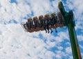 Russia, Arkhangelsk - July 2019. A young heterosexual couple rides scary merry-go-rounds in an amusement park. Emotions, extreme,