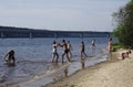 Russia - Berezniki July 18 : young people jump into the river at sunset