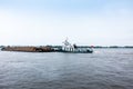 a sand Barge on the Amur river near the city of Blagoveshchensk in summer