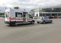 Russia, Chelyabinsk, 08/20/2020 An ambulance car with open doors is on a city street on a city street, and the car is receiving me