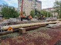 Russia, Chelyabinsk 08/02/2020, construction equipment and workers are busy replacing sewer and heating pipes,