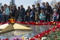 RUSSIA, Chita - MAY 9: Laying flowers at the eternal fire on celebration of Victory day in the WWII