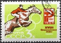RUSSIA - CIRCA 1964: A stamp printed in USSR Soviet Union , shows Equestrian and Russian Olympic Emblem. 18th Olympic