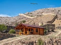 Tourist wooden cottage at the foot of the Gunib fortress. Dagestan