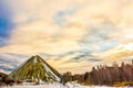 Russia. Degtyarsk . A dump of empty copper rocks a waste heap against the sky.