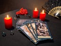 Russia, Dzerzhinsk, October 09, 2021. Cartomancy, fortune telling, predictions on Tarot cards. Magical objects, candles