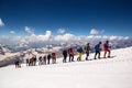 Russia, Elbrus - JULY 29, 2018: a Group of climbers lined up one after another go to the top of the mountain.every year thousands