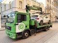 Moscow, Russia, December, 13. 2020. The evacuation of the white car from the street Small Tolmachevsky pereulok in Moscow in winte